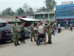 Brigif TP 37/HS Bagikan Masker Kepada Masyarakat Bersama Forkopinca Laubaleng